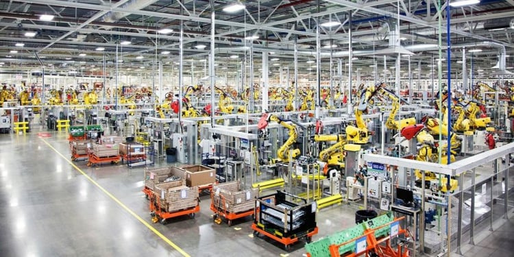 Fanuc Robots and Industrial Equipment on Shop Floor.