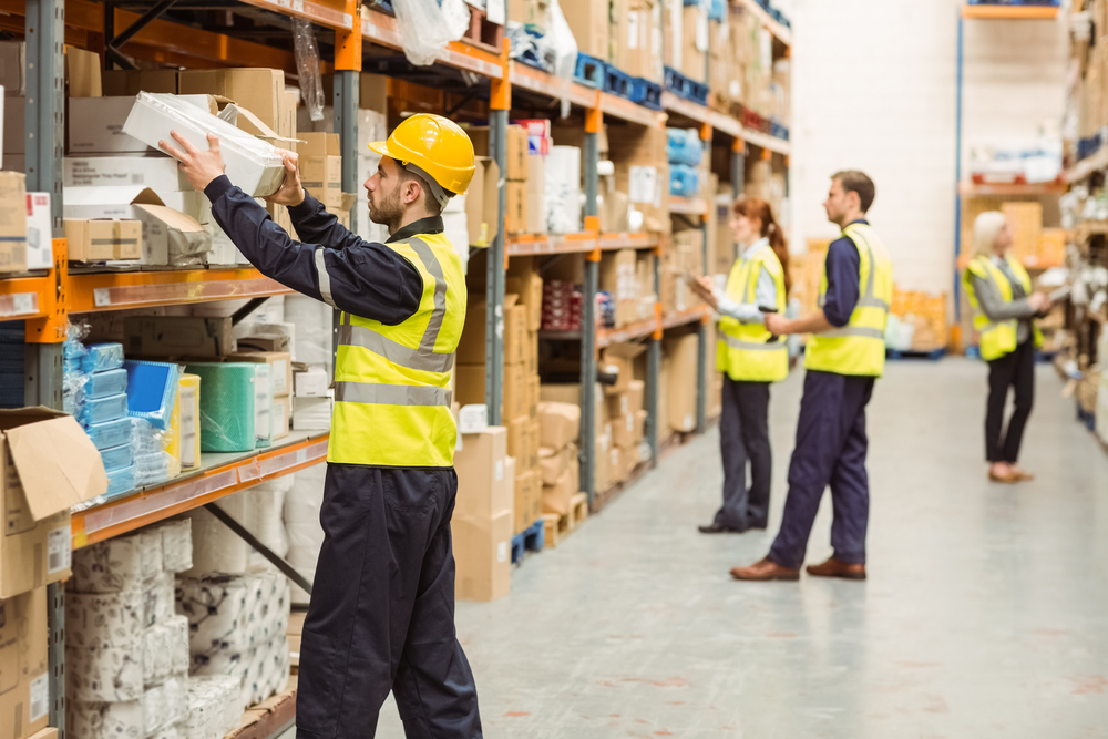 Warehouse Worker Handling Packages