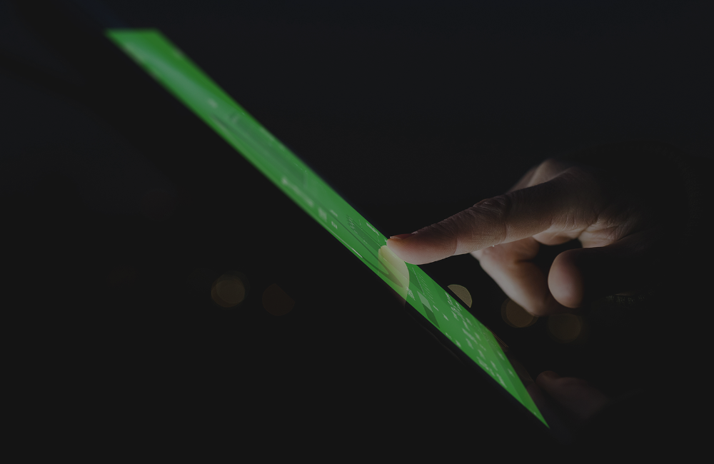 Finger on Tablet in the Dark